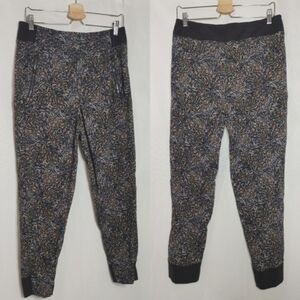 Athleta TREKKIE‎ NORTH HIGH RISE JOGGER Pants 10 Purple Black Abstract 533655